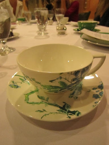 Tea cup on a white table cloth